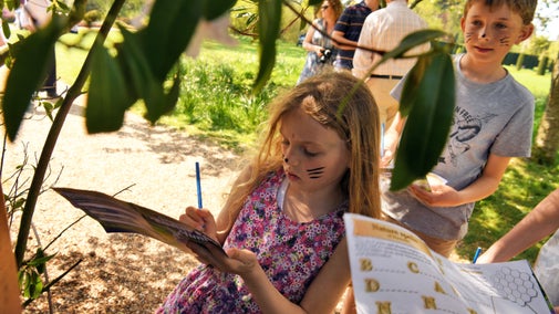 Children doing an Easter trail at Standen